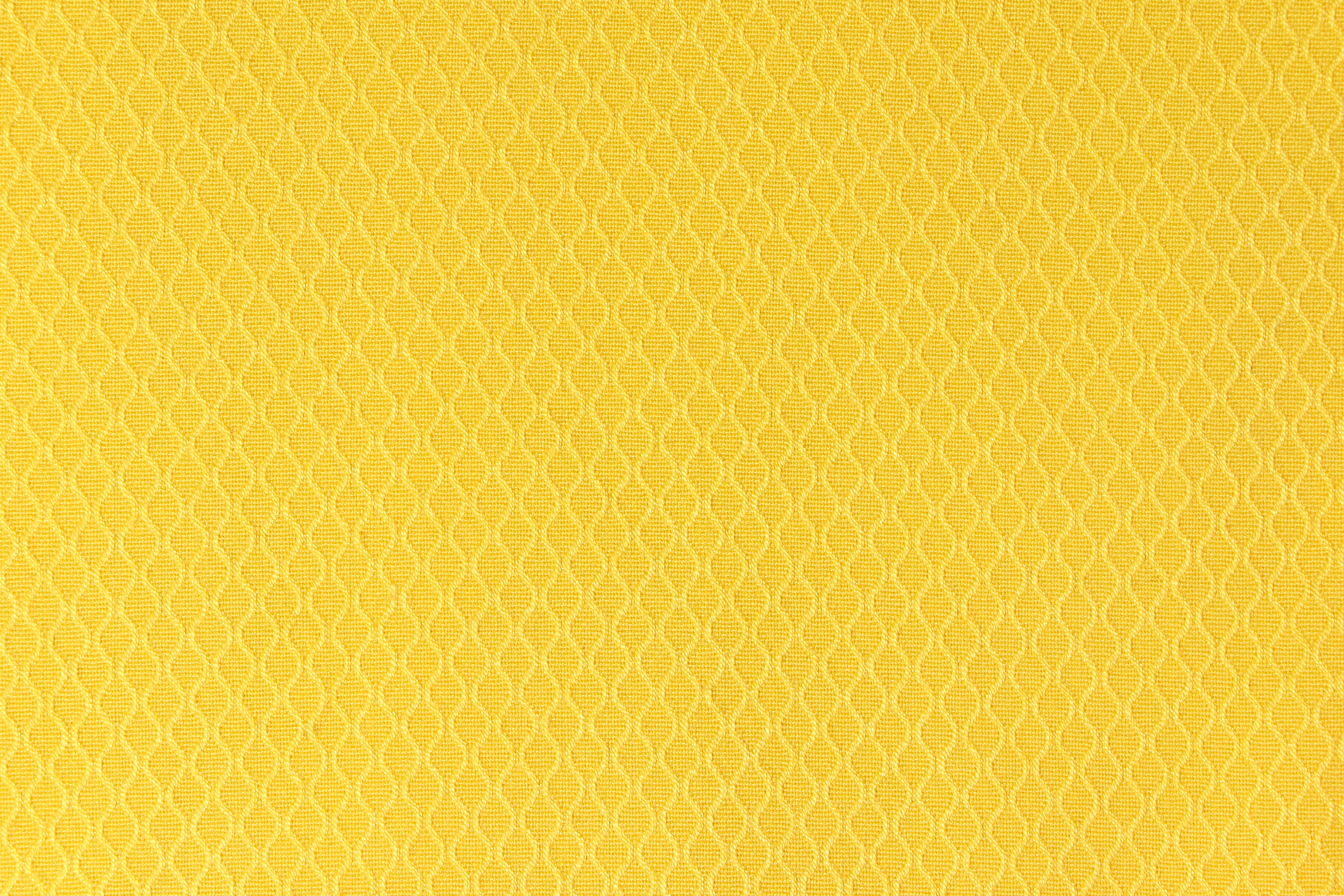 Yellow background. Yellow Synthetic fabric texture, background. Yellow fabric.